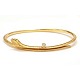 Aabenraa 
Antikvitetshandel 
præsenterer: 

Ole 
Lynggaard 
Snakes armring. 
Oplukkelig oval 
armring i 18kt 
guld ...