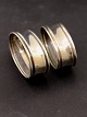 Middelfart 
Antik presents: 
A pair of 
almost 
identical 
napkin rings