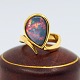 Antik 
Damgaard-
Lauritsen 
præsenterer: 
Georg 
Jensen; Ring i 
18 kt. guld med 
opal