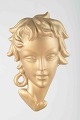 Italian wall 
relief, female 
head, 1950s.
