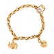 Aabenraa 
Antikvitetshandel 
presents: 
14kt gold 
Ole Lynggaard 
Copenhagen 
bracelet with 
two charms and 
white gold ...