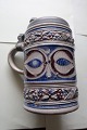 Antique mug with a lid of tin/pewterPotteryH: 17cm (see photo)StampedIn a very good condition
