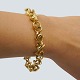 Antik Damgaard-Lauritsen præsenterer: Regitze Overgaard for Georg Jensen; Magic armbånd i 18 kt. guld, i ...