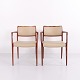 Osted Antik & Design præsenterer: Et Par Armstole Model 65 i Palisander med Lyst Elegance Læder N.O. Møller ...