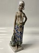 Antik Huset præsenterer: Dahl Jensen orientalsk figur, pige fra Øst Sierra Leone.Dek. Nr. 1117.
