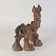 Kinnerup Antik & Porcelæn præsenterer: Thomas Dam figurBagud kiggende hest18,5 cm