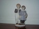 Royal Copenhagen Figurine,
The Flight to America
Dec. Number 1761.
