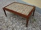 Sofa table in rosewood from Haslev Furniture with Royal tiles 5000 m2 showroom