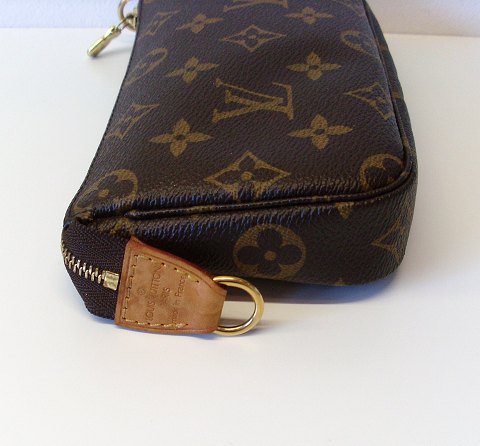 www.Antikvitet.net Louis Vuitton kosmetikpung monogram kanvas