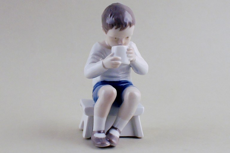 B&G (Bing & Grondahl) boy with mug, number 1713.