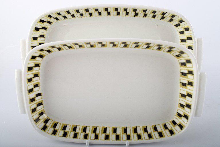 A pair of Rorstrand Domino retro ovenware dishes.
