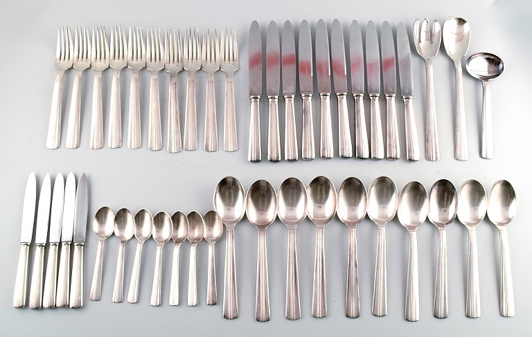 Large complete 10 p. Ercuis Art deco cutlery in silver plate.