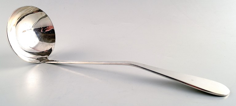 American sauce ladle in silver.
