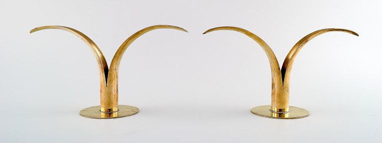 A pair of patinated brass, "Liljan" Ivar Aalenius Björk, Ystad metal.