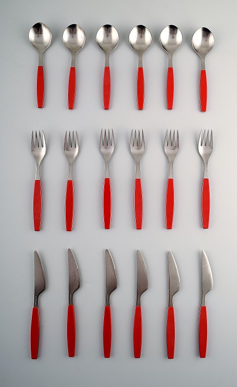 Complete service for 6 p., Henning Koppel. Strata cutlery made of stainless 
steel and red plastic. Produced by Georg Jensen.