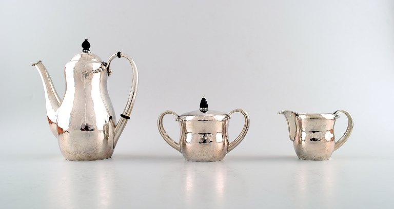 Evald Nielsen, Danish silversmith coffee service in silver, and lid knobs in 
ebony, 1920s.