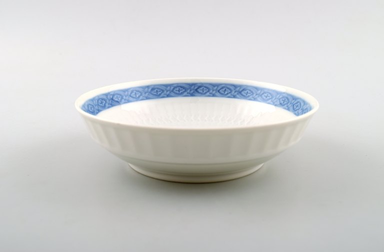 Royal Copenhagen bowl, Blue Fan. Designed by Arnold Krog in 1909. White 
porcelain frame with light blue edge.
