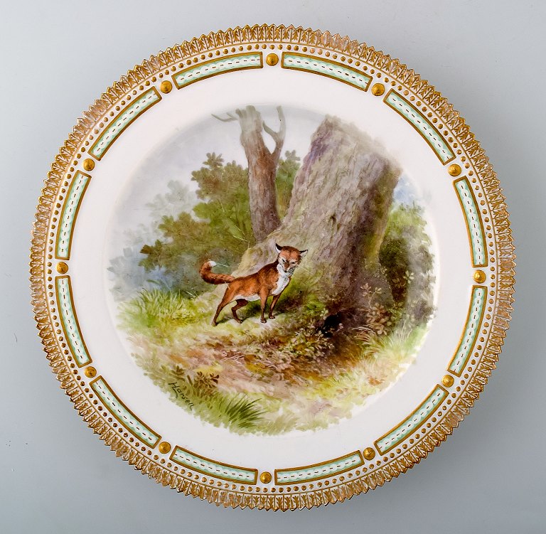 Royal Copenhagen Flora Danica / fauna Danica dinner plate with  motive of a fox 
in a landscape.