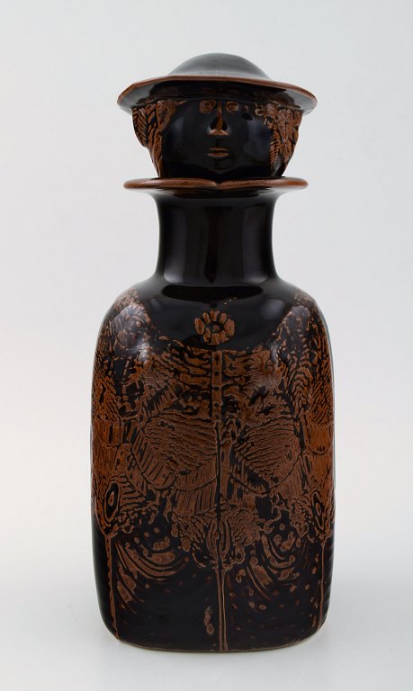 Stig Lindberg (1916-1982), Gustavsberg Studio pottery decanter in ceramics. The 
stopper in form of a face.