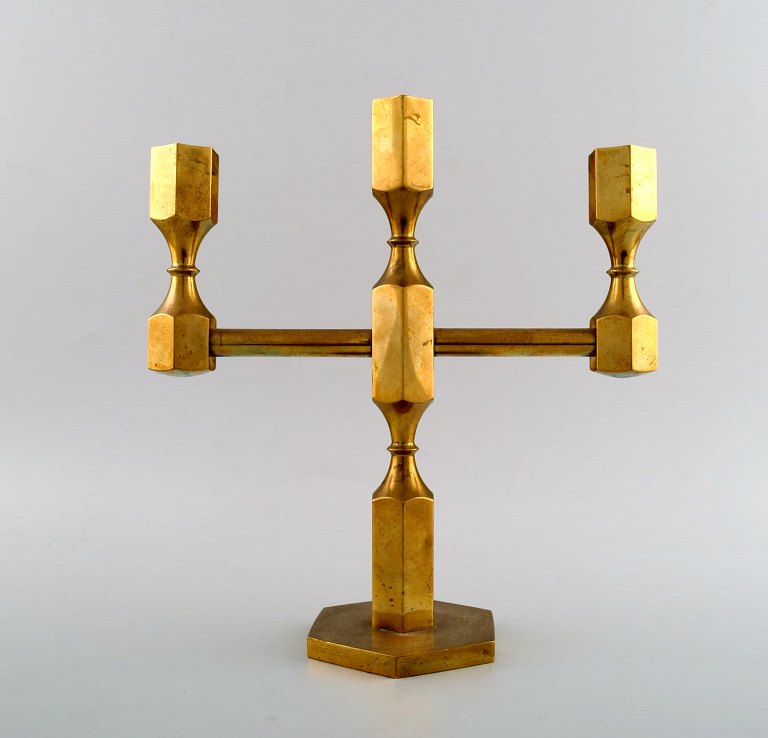 Gusum metal, brass candlestick for three lights.
Swedish design.