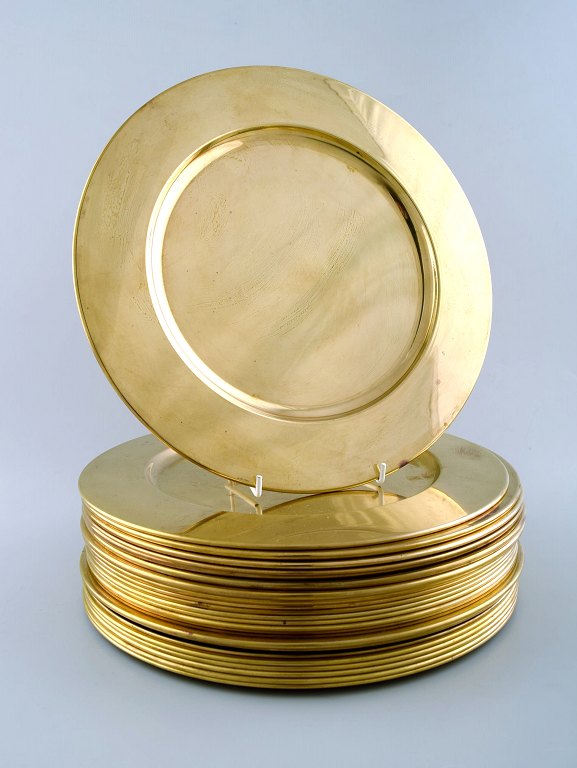 Set of 24 cover plates in brass.
Danish design 60s.