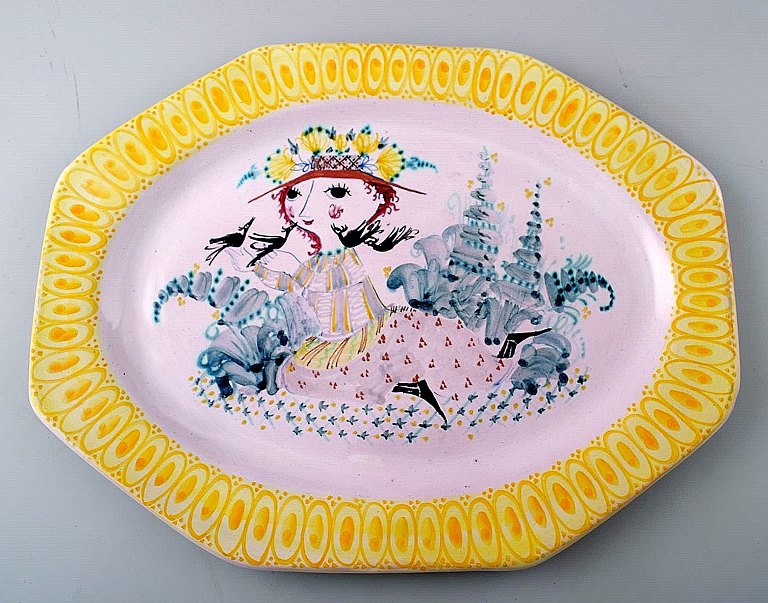 Bjorn Wiinblad: Rare and early unique large oblong yellow platter decorated with 
a woman with flowers in her hair, Bjorn Wiinblad 1950.