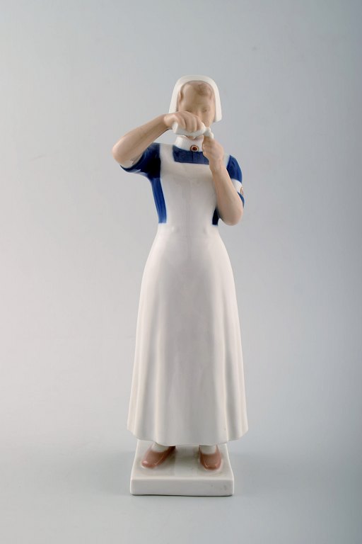 Bing and Grondahl nurse, porcelain figurine, number 2226.
