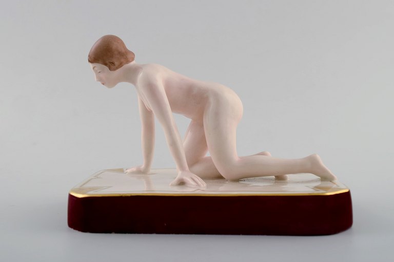 Art deco Royal Dux naked woman on base, porcelain.
