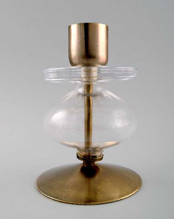 Erik Höglund for Kosta Boda, candlestick in cast iron with hand-blown glass.