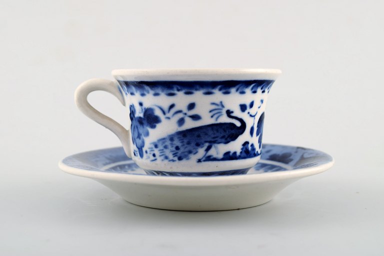 Peacock from Copenhagen faience / Aluminia.
Coffee / mocha cup with saucer in faience.