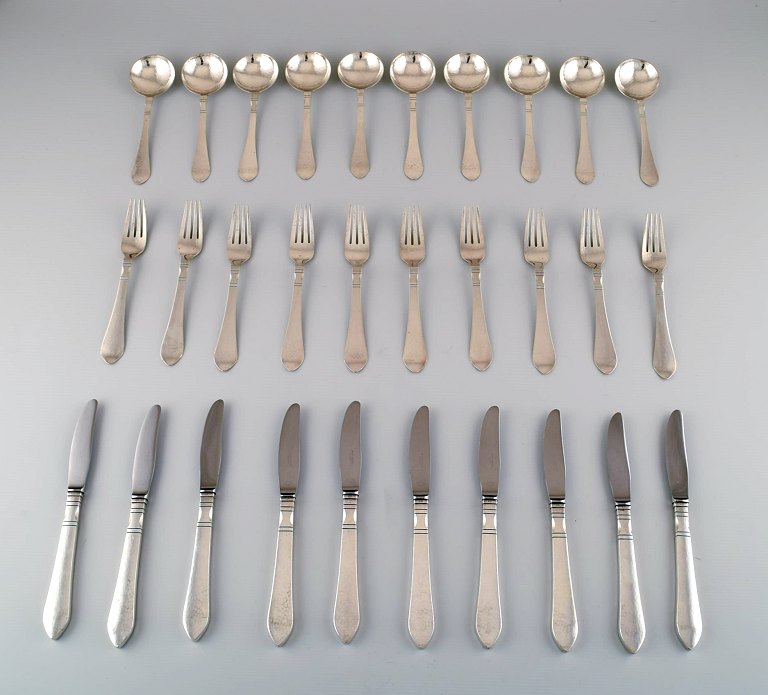 Georg Jensen. Continental (Antik) 10 p. Complete lunch silver service, hand 
hammered.