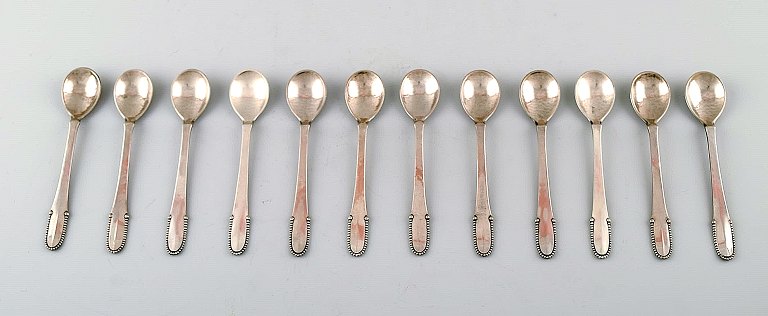 Georg Jensen Beaded 12 coffee spoons in full silver.
