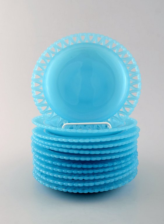 11 Swedish design plates in turquoise art glass. Pierced edge.