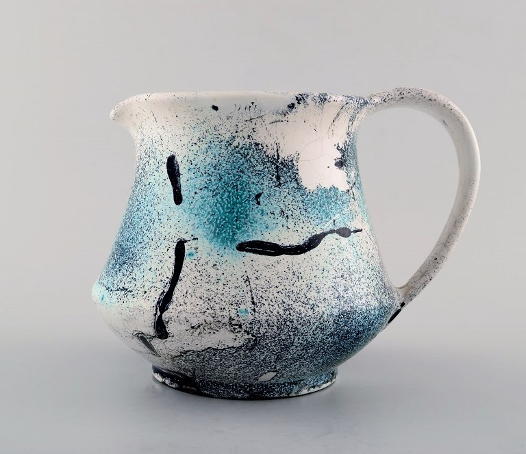 Jens Thirslund (1892-1942) Kähler pitcher decorated with greenish glaze.