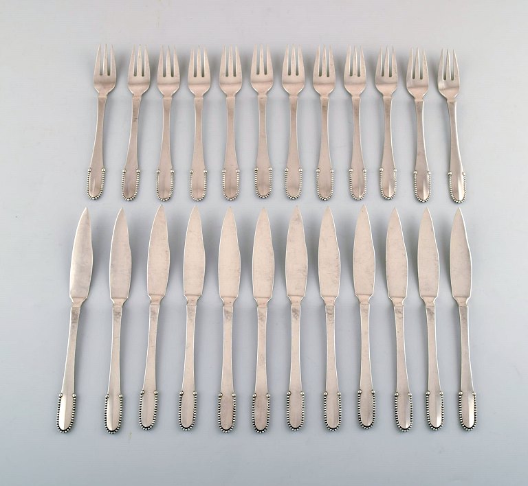 Georg Jensen Kugle komplet 12 personers fiskeservice.
