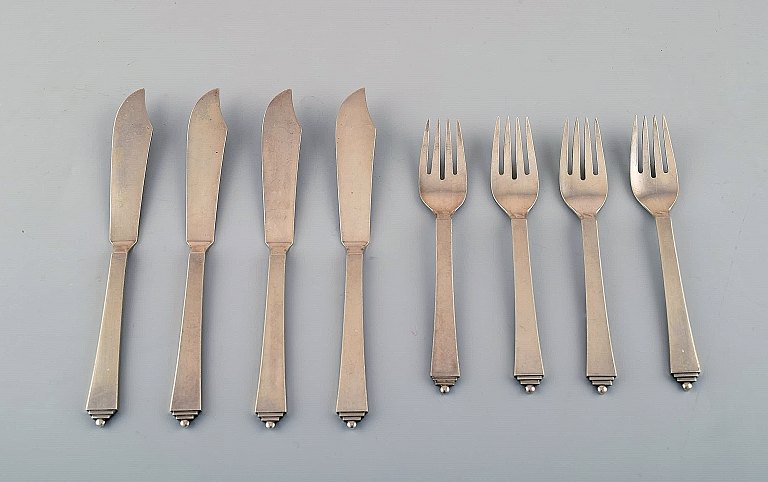 Four sets of Georg Jensen Pyramid fish knife and fish fork. Sterling silver.
