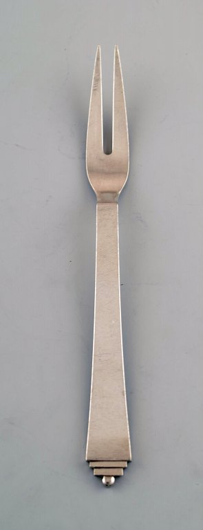 Georg Jensen sterling silver pyramid meat fork.
