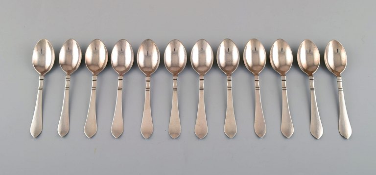Georg Jensen Continental, 12 child spoons/ large tea spoons, silver cutlery, 
hand hammered.