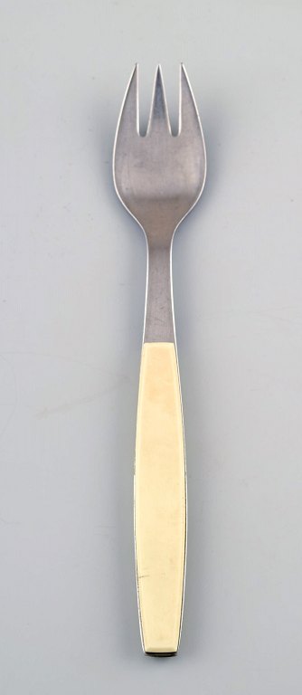 Lunch Fork. Henning Koppel strata cutlery made of stainless steel and white 
plastic.
