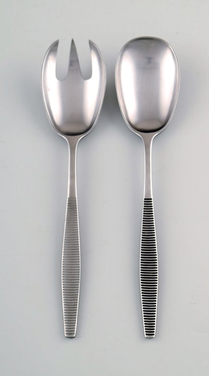 Jens H. Quistgaard "Variation VI" cutlery of handmade stainless steel.
Salad set.