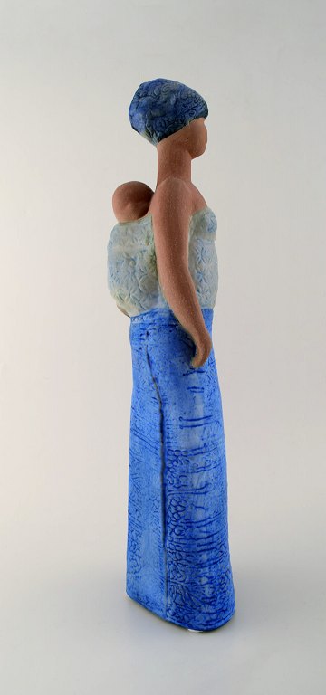 Lisa Larsson, very rare large figure, Mother carrying child.
Gustavsberg Swedish ceramic figure decorated with glaze.