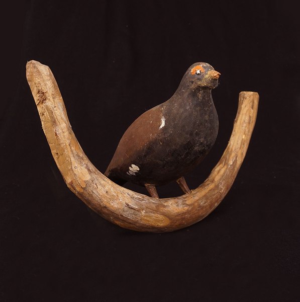 Swedish folkart: A bird, wood. Late 19th Century. H: 22cm. W: 35cm