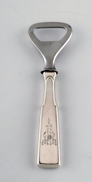 Hans Hansen silverware number 2. Bottle opener in danish silver and stainless 
steel. 
