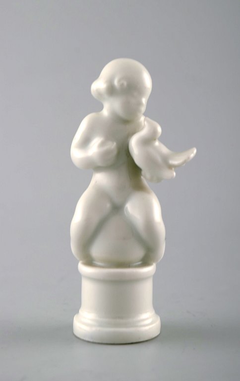 Rare Dahl Jensen figure. Blanc de chine. Child with bird. Model Number 1044.
