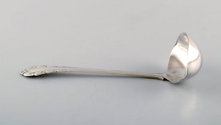 Georg Jensen "Lily of the valley" sauce spoon in full silver.
