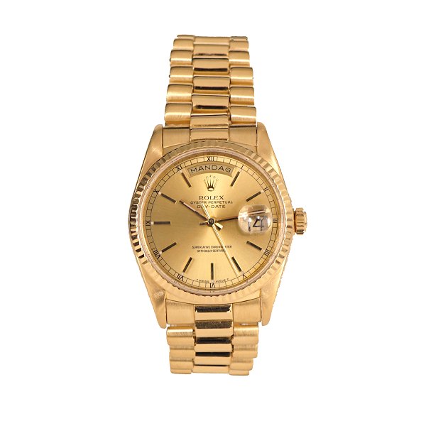 Rolex Day Date in 18kt gold. Full set with box, papers etc. Ref. 18238. D: 36mm. 
Bought 1989