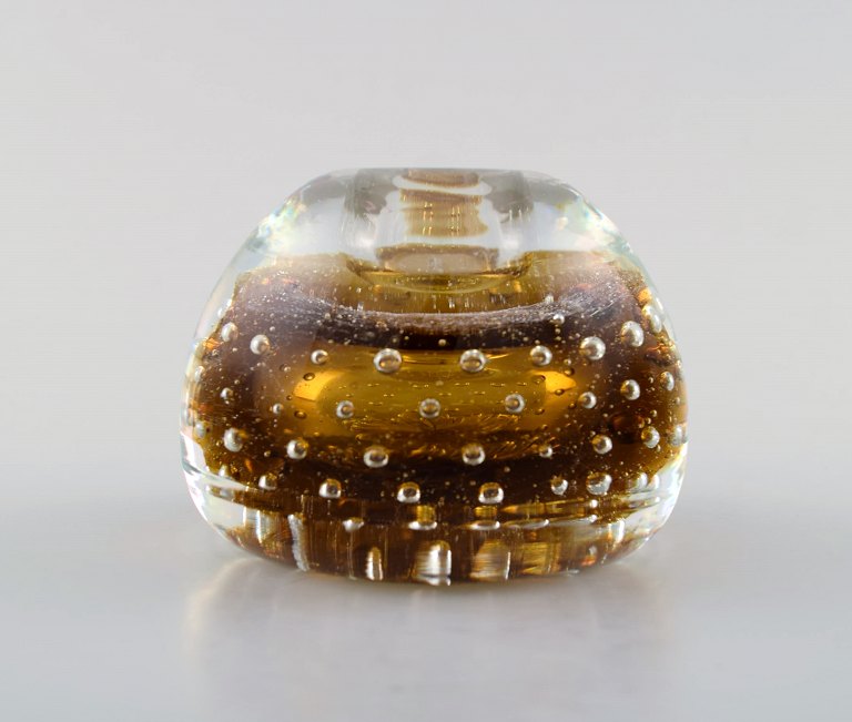 Murano, amber colored candle holder in mouth blown art glass, 1960s.
