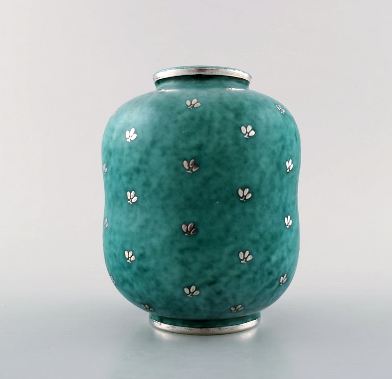 Wilhelm Kåge, Gustavsberg, Argenta Art deco ceramic vase decorated with leaves 
in silver inlaid.