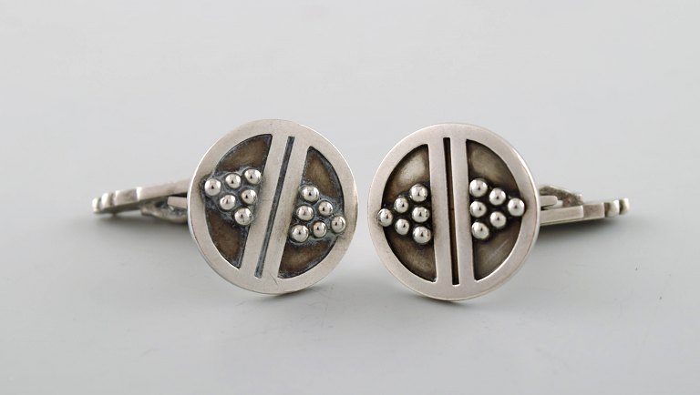 A pair of art deco cufflinks in silver by Georg Jensen. Design number 57.