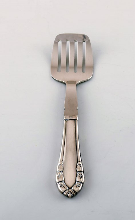Georg Jensen "Lily of the Valley" sardine fork in sterling silver and stainless 
steel.